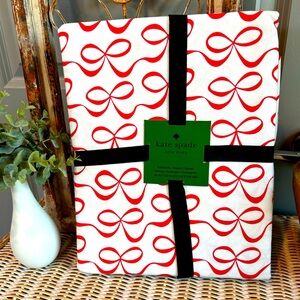 Kate Spade New York Coquette Red Bow Fabric Oblong Tablecloth, 60" x 102".